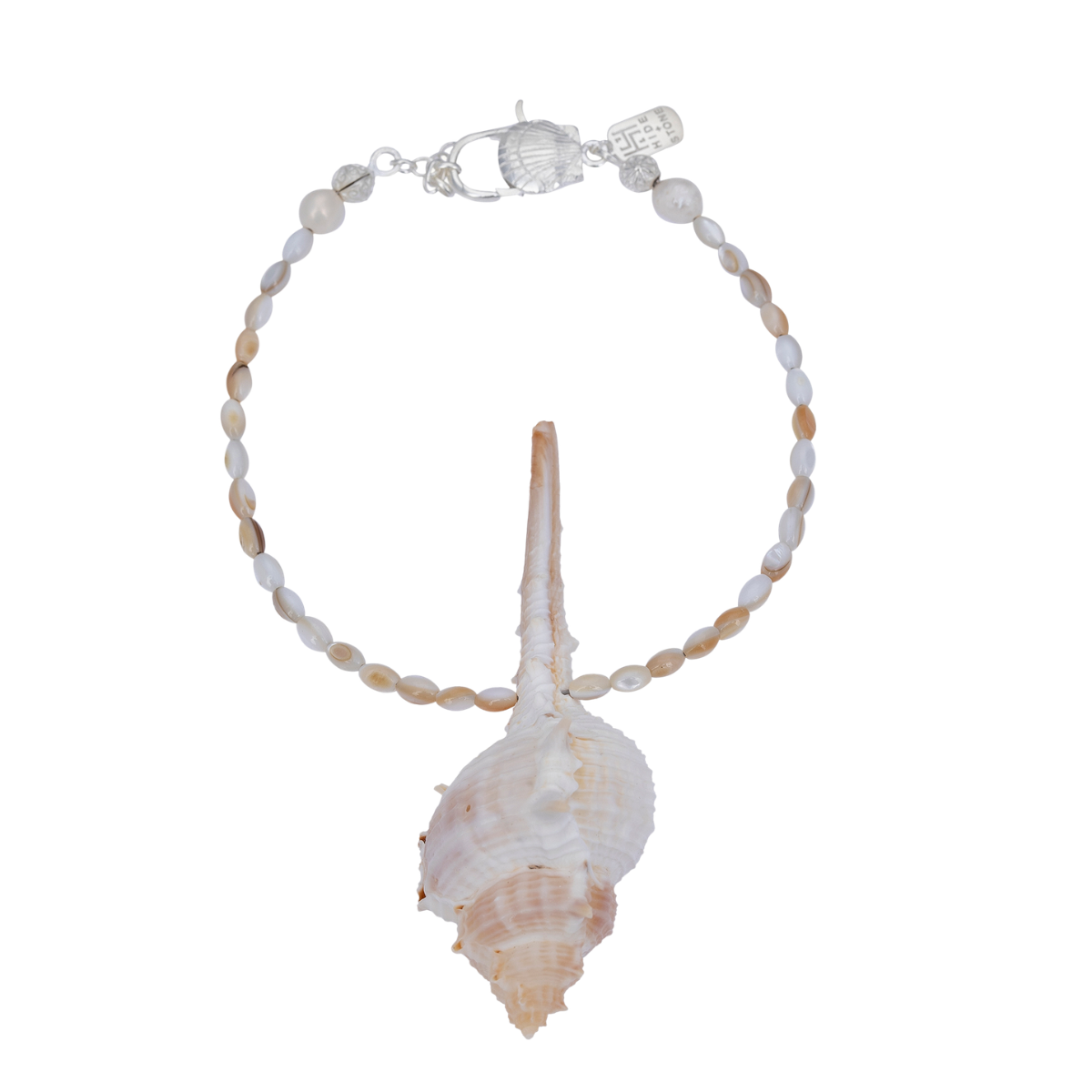 Mother-of-pearl heishi bead bracelet, alternating beige and white shell beads, with a large, central natural conch shell pendant, sterling silver shell clasp and extension chain, pure white background.