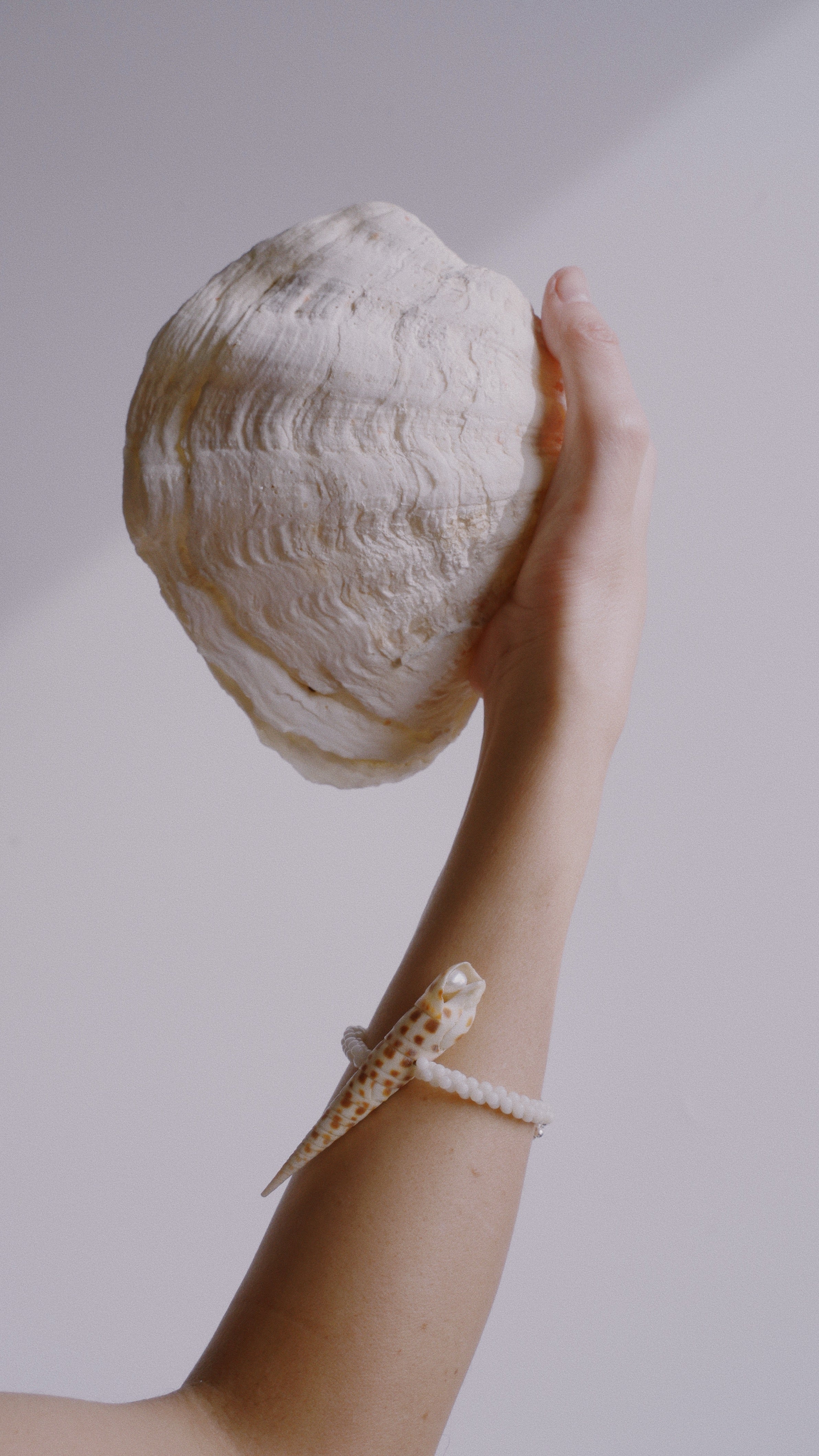 A close-up image of a person's wrist wearing the Solete Bracelet.