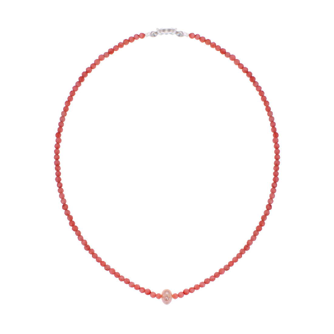 Artisanal neckpiece featuring vibrant faceted coral beads centered by a single organic pearl.