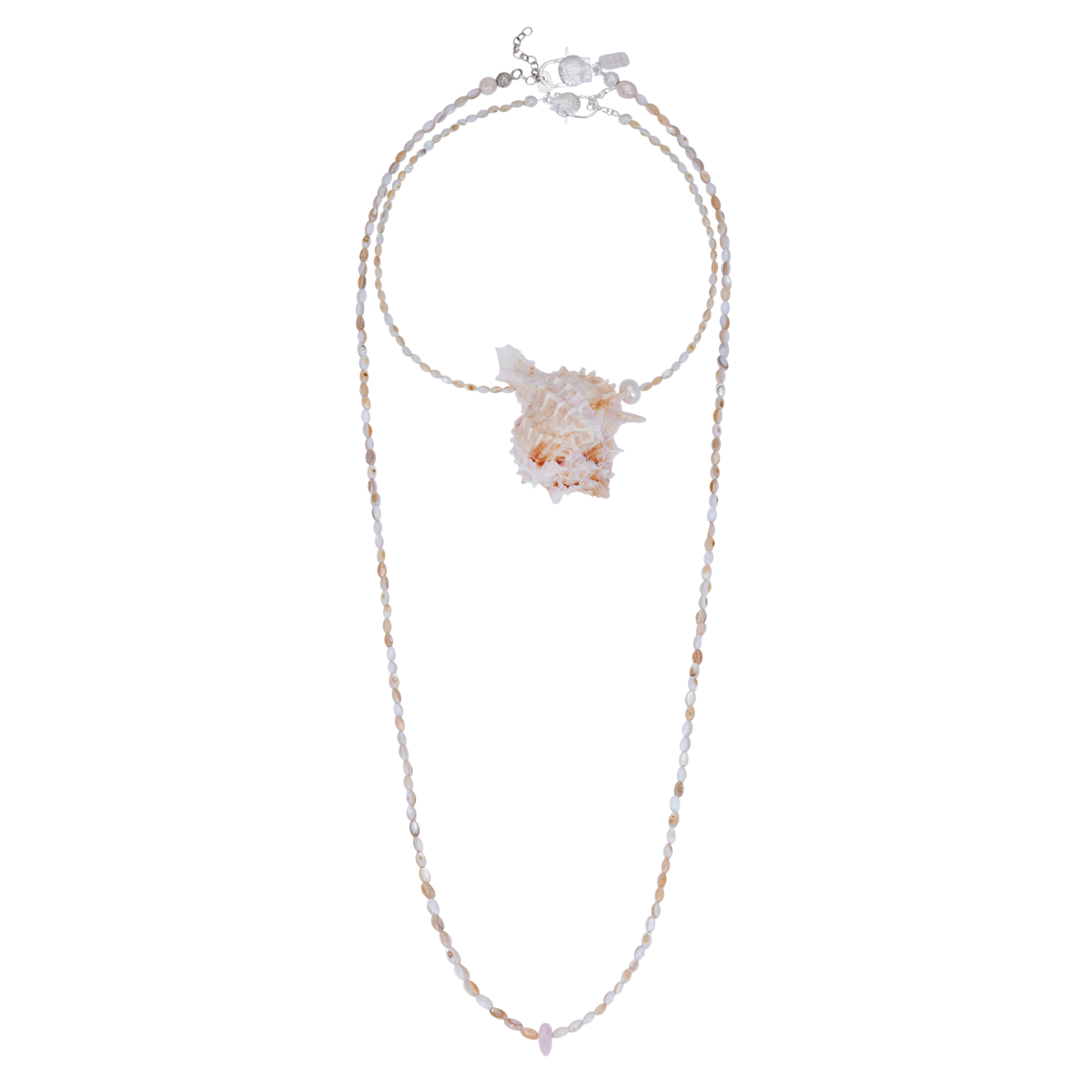 A display of two necklaces: a short statement piece with a large murex shell and pearl pendant, and a longer, simple mother-of-pearl heishi bead strand.