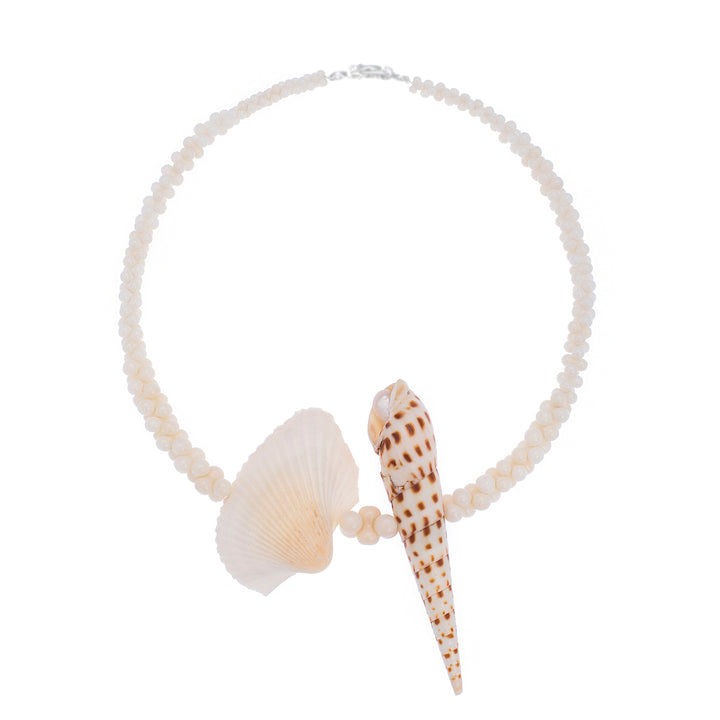 A hand-polished necklace with Oxymeris areolata and Lima lima shells encircled by hand-polished coral beads, featuring a single freshwater pearl.