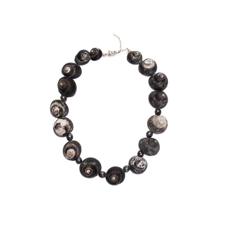 A sterling silver-finished necklace with a combination of pearlized Umbinium and black pearls, with adjustable link.