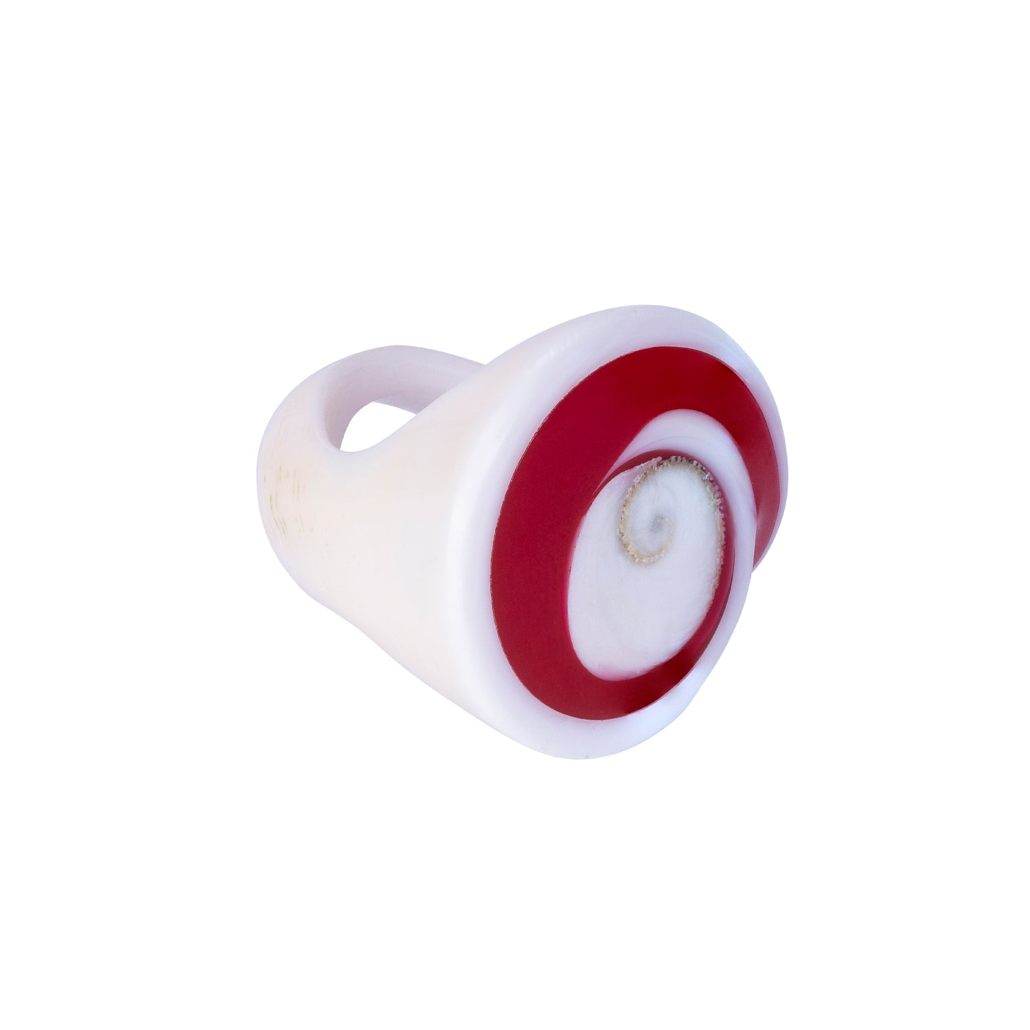 A hand-carved seashell ring with red and white colors, set with a semi-precious stone.