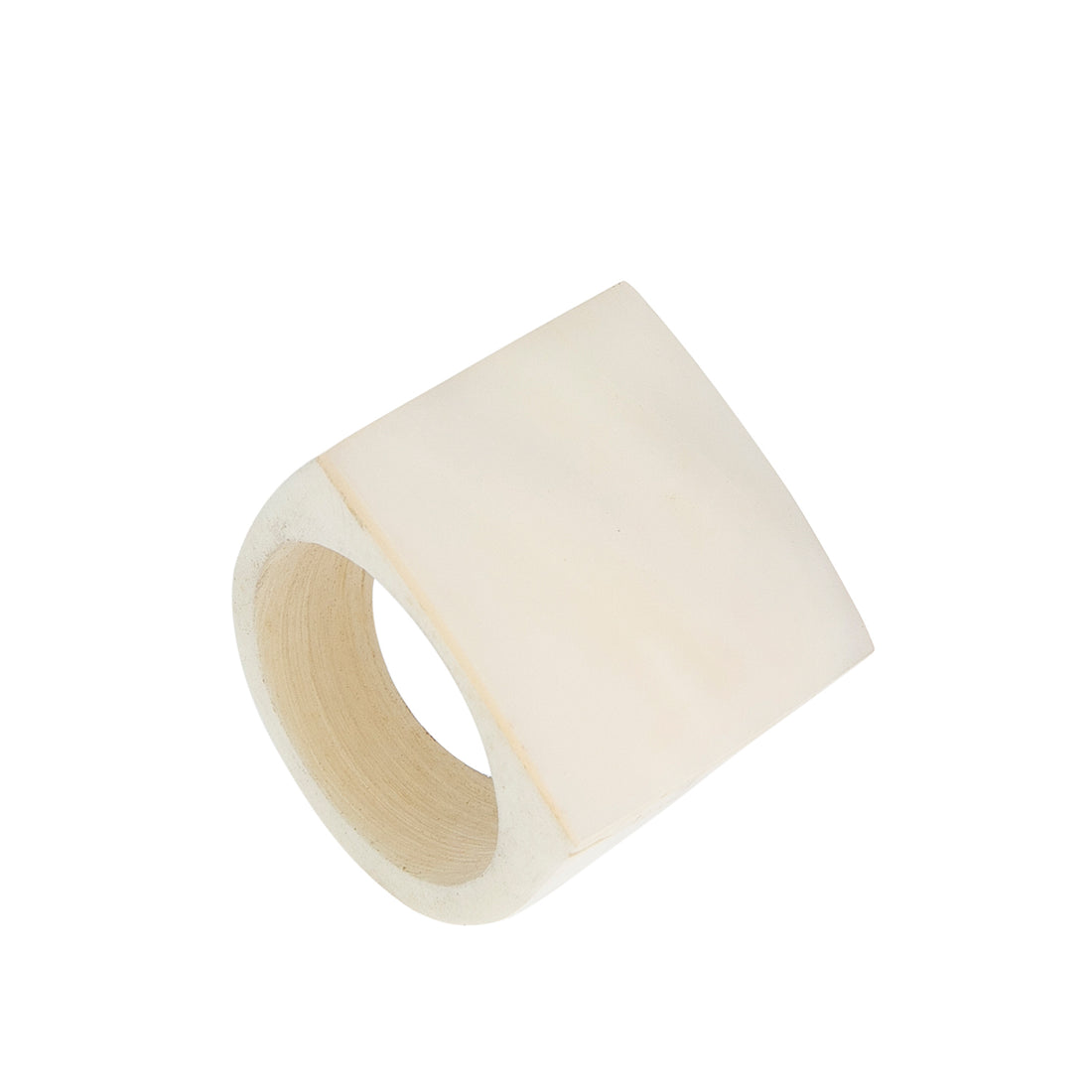A hand-carved seashell ring made with semi-precious stones.