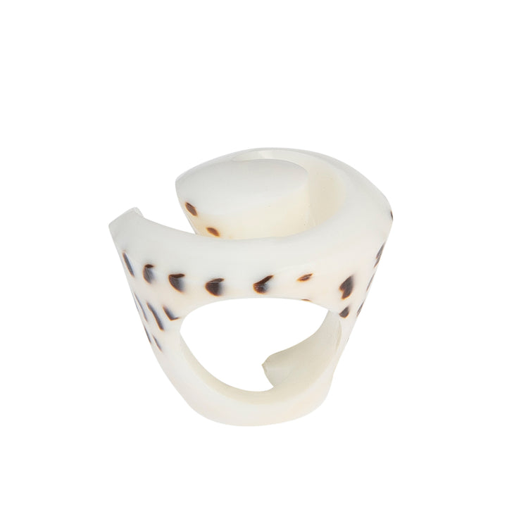 A hand-carved seashell ring made with semi-precious stones.