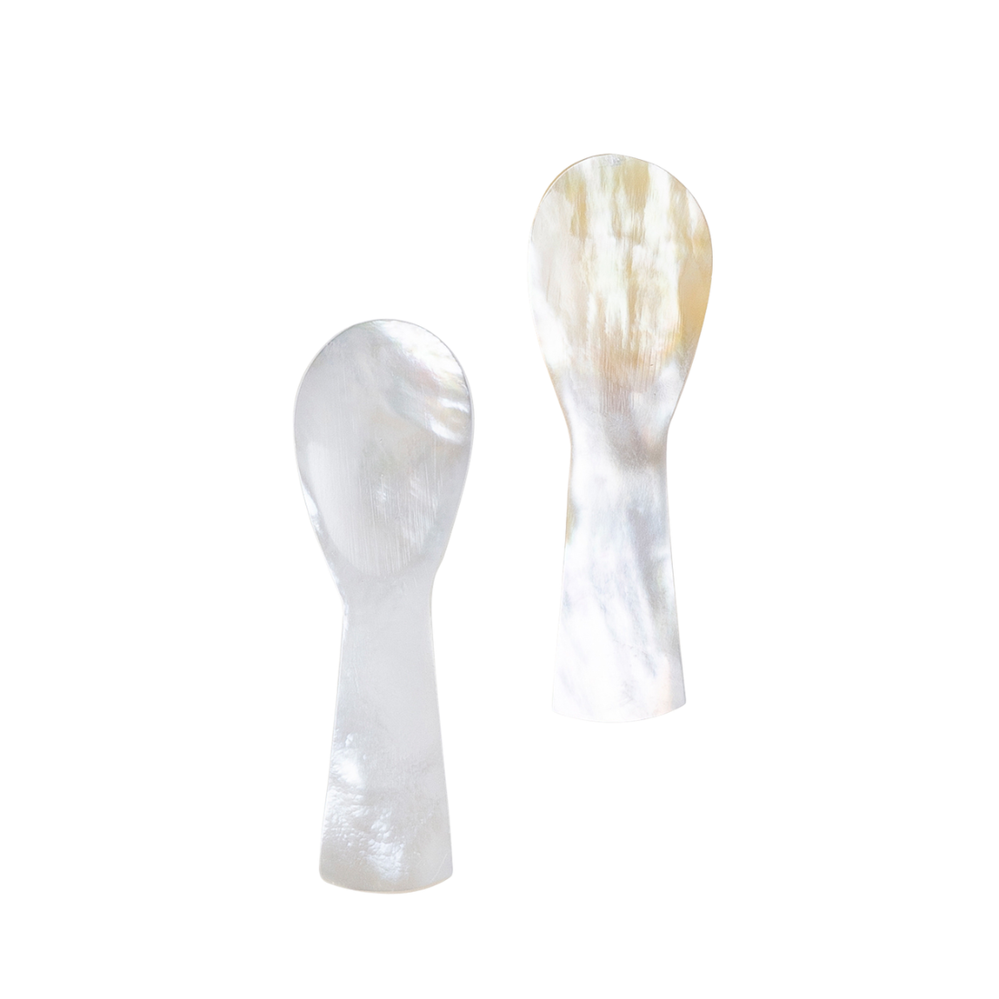 2 spoons handcrafted from luminous pearl shell.